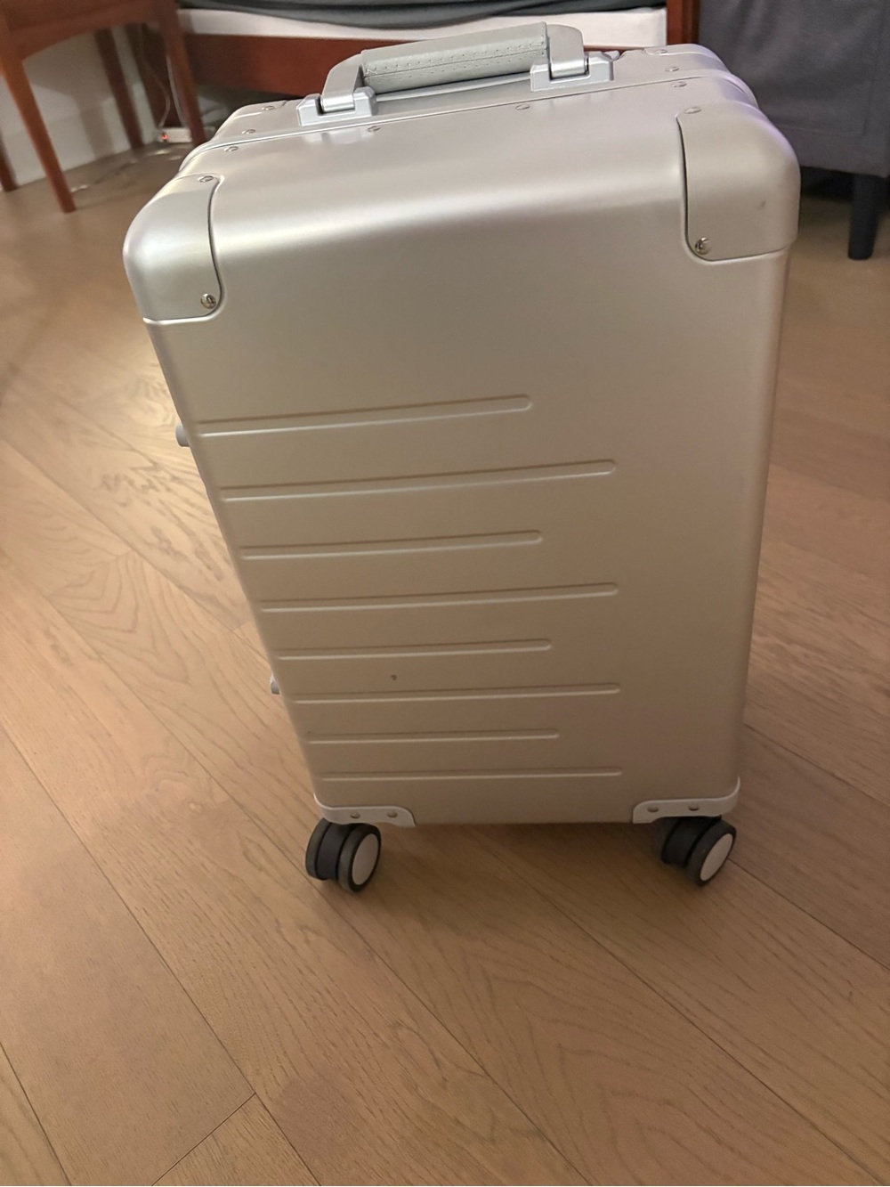 Silver aluminum Spinner Carry-On Luggage